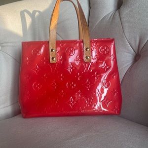 Red Authentic LV bag. Pristine condition. No exterior marks, spots, or damage.